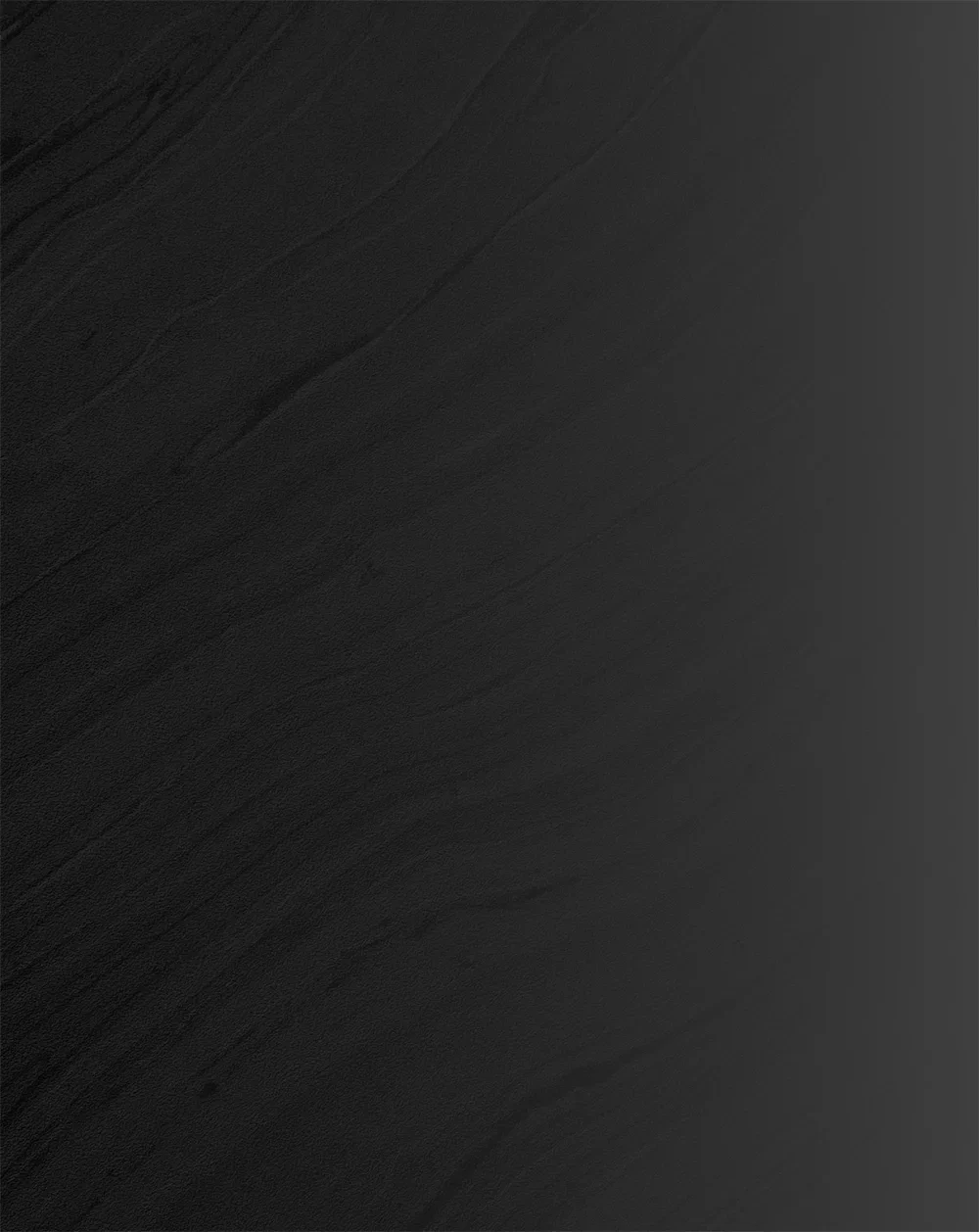 Dark textured background with subtle gradient from black to charcoal gray